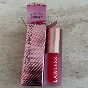 5/25✨lip plumping lip gloss in cherry vanilla lawless